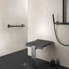 Carbon tip up shower seat