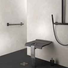 Graffiti tip up shower seat